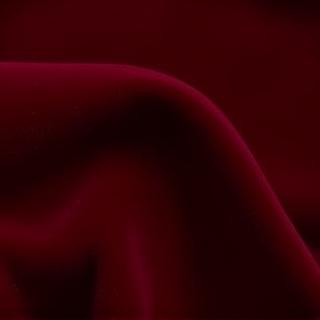 Rich velvet fabric swatch in deep burgundy, suggesting luxurious custom bedding